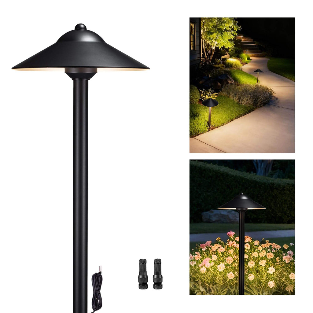 Brass path light mounted on garden and walkway, illuminating the area with warm white light.