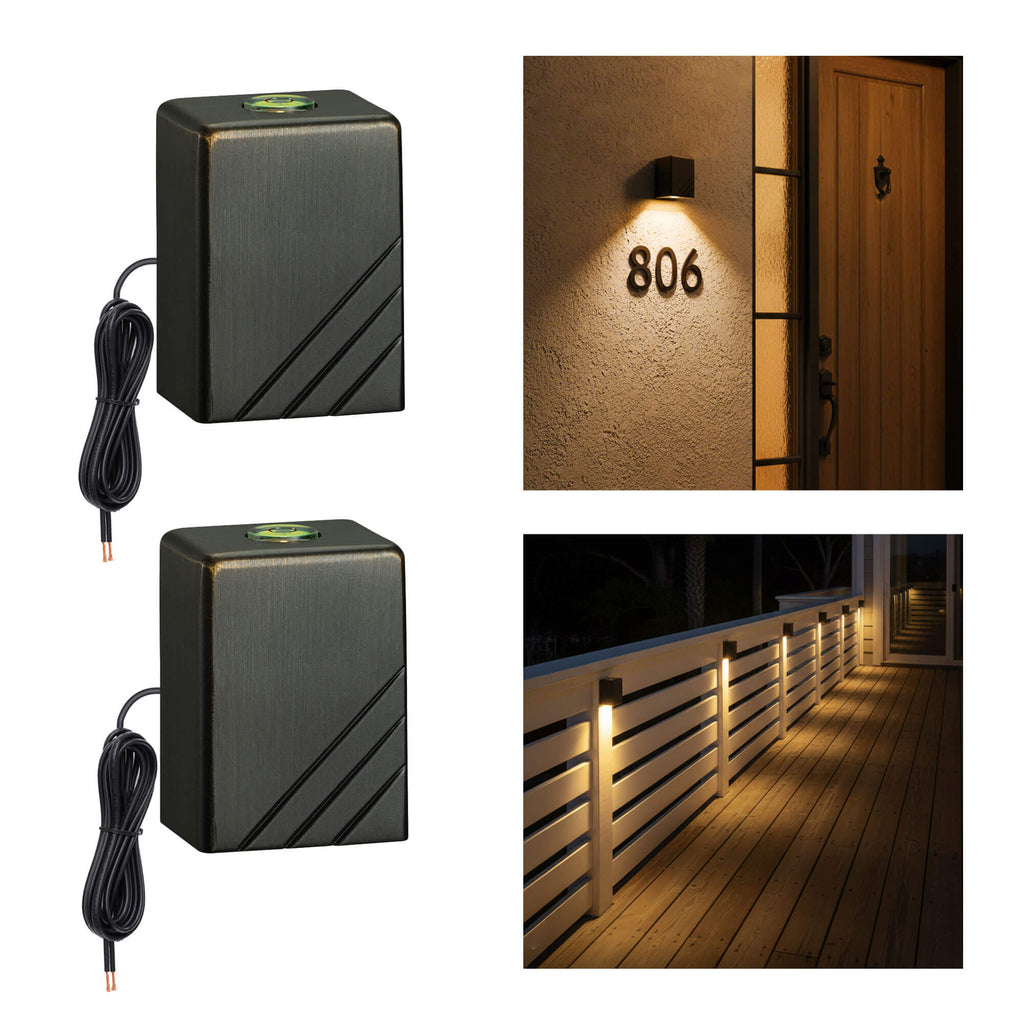 Brass wall light mounted on handrail and front house, illuminating the area with 2700k warm white light.